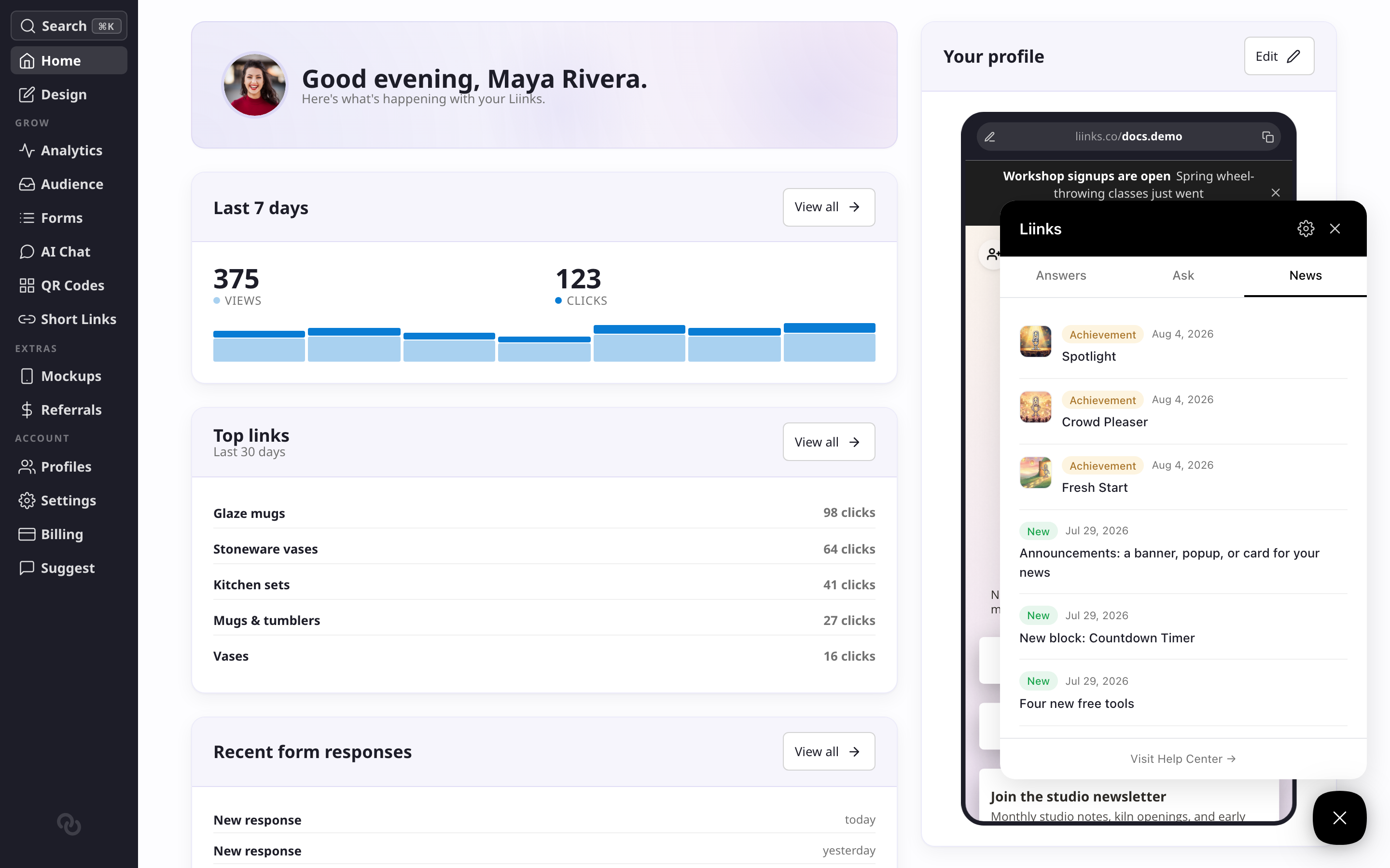 The help beacon open on the News tab, showing product updates and earned achievements